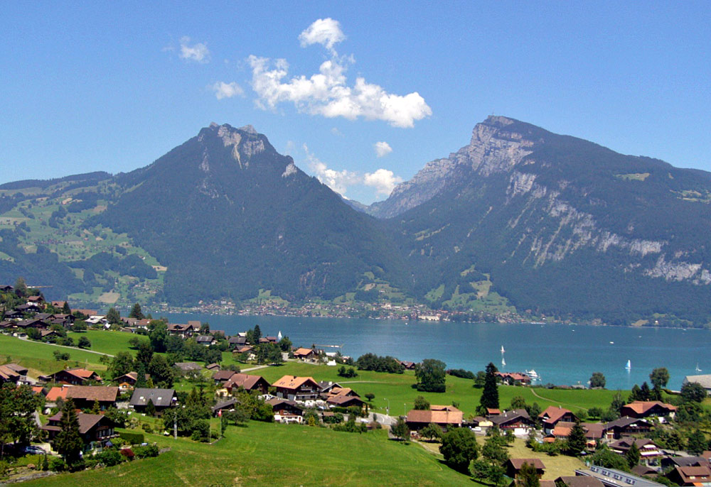  A lake near Interlaken, Switzerland serves many purpose, both natural and for humans.