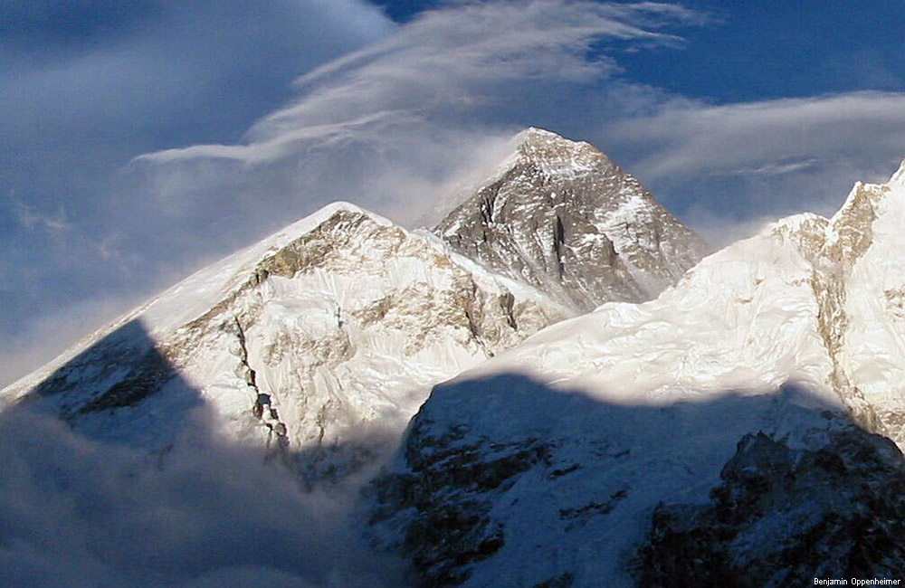 Mt. Everest, losing some snowcover due to a common windstorm. Snow is also constantly lost, invisibly, due to sublimation.
