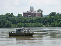 sampling the Missouri River at Hermann, Missouri; July 2011 - Photo by Kelly Brady, USGS