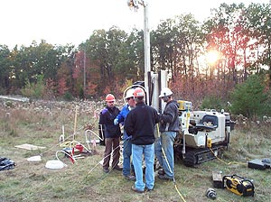  [Photo: Photo: USGS personnel operate equipment.] 