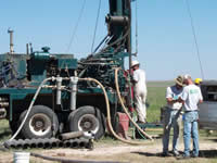  [Photo: Monitoring well installation in the High Plains aquifer near Muleshoe, Texas ] 