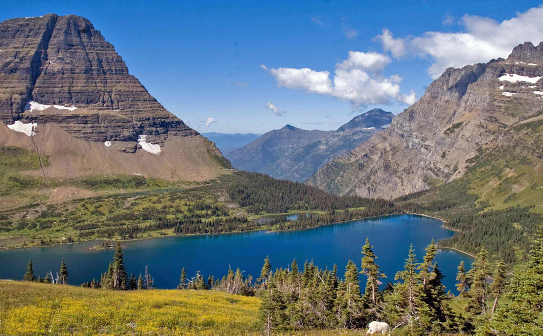 Hidden Lake, Glacier National Park, Montana, is nestled in the high mountains, and runoff from the steep slopes of surrounding landscape helps to keep the lake full. Credit: Lisa McKeon, USGS