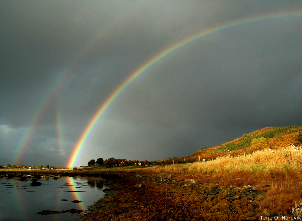 Mulitiple rainbows seen in a passing rainstorm in Norway. Credit: Terje O. Nordvik)