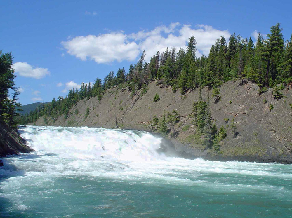 Bow River falls, downstream from the Bow Glacier in Banff, Canada, during springtime melting conditions. Credit: http://www.rocky-peak.com/