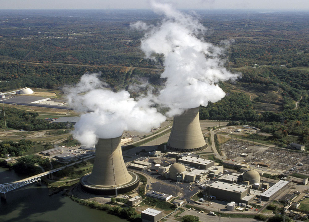 Aerial photo of Beaver Valley Power Station in Pennsylvania, showing evaporation from the large cooling towers.