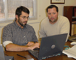  [Photo: USGS OGW, BG scientist works with USGS Massachusetts scientist to process water-borne continuous-resistivity data.] 