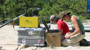  [Kamini Singha (PhD '05, Stanford University) (right) conducts field research with assistance from Mike Lambert (BS '03, University of Connecticut).] 