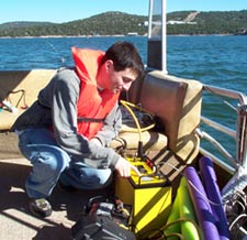  [Marcel Belaval  (MS '03, Boston College) collects marine resistivity data.] 
