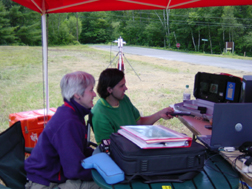  [Photo: USGS staff running borehole optical imaging logging computers] 