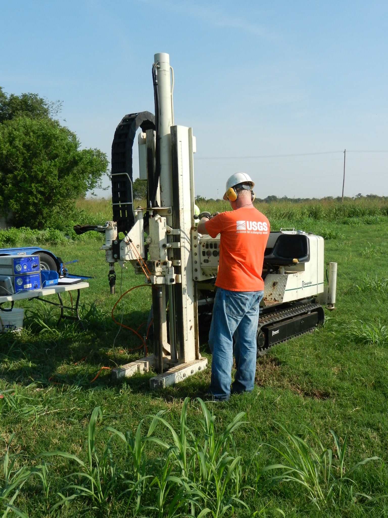  [USGS personnel operate equipment in the field] 