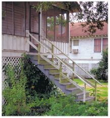 [Photo: Figure 7 - Everglades Station with stairs added to front porch.] 